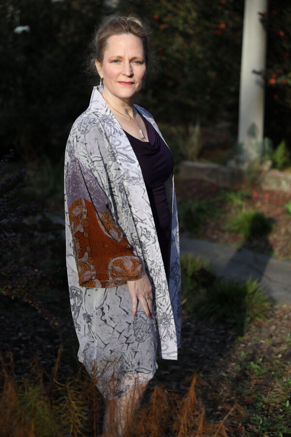 woman wearing white kimono cardigan