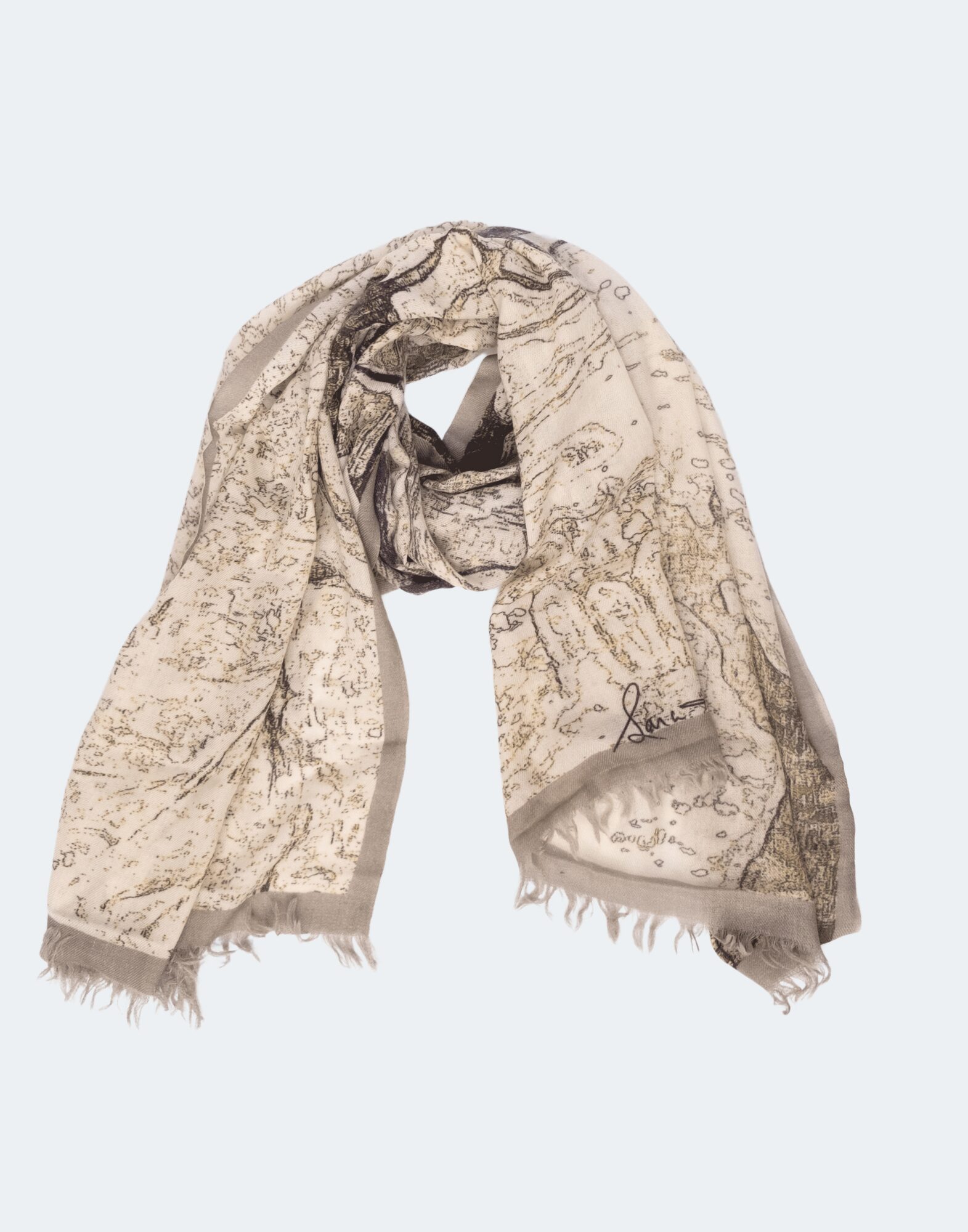 scarf in tans, cremes, and grays that depicts an image of trees